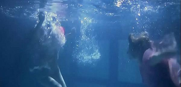  Two hot lesbians underwater touching each-other. Young girls schoolgirls are naked in the pool. Young nudists ..